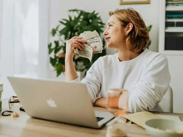 affiliate marketer working from laptop